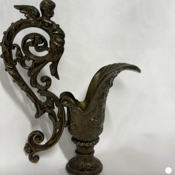 Ornate brass cherub ewer serving  handle & spout